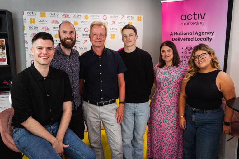 Allan MacDougall with some of the activ Head Office Team